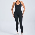 Black halter neck yoga jumpsuit with V-neck pleats and tight athletic fit for women - S / Black