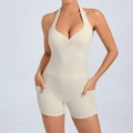 Halter neck backless yoga romper in off-white with side pockets and ruched detail - M / Beige