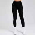 High-waisted black yoga leggings with ergonomic curved seams and matte compression fabric - S / Black