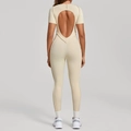 Combinaison de yoga moulante beige crème à manches courtes avec dos nu et leggings - Beige