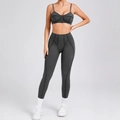 Dark gray two-piece yoga set featuring a sports bra and high-waisted leggings with stitching - S / Charcoal Gray