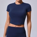 Nauwsluitend donkerblauw crop-top yogashirt met vochtafvoerende mouwen voor dames - S / Marineblauw