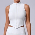 Sleeveless white athletic vest featuring a high neck zipper and pointed hem for yoga - S / Polar White