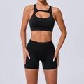Women's black yoga set with cutout sports bra and high-waist compression shorts - S / Black