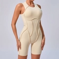 Mouwloze beige yoga bodysuit met decoratieve naden voor een mooi gevormde sportieve look - S / Beige