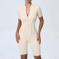 Tuta sportiva beige a maniche corte per donna con cerniera frontale e cuciture - S / Beige