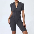 Dark grey short sleeve yoga romper with front zipper and ergonomic body contour lines - Charcoal Gray