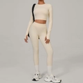 Beige two-piece yoga set with long sleeve thumbhole top and high waisted leggings - Beige