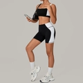 Zwart-wit tweedelige yogaset voor dames met sportbeha en korte broek met hoge taille - S / Zwart
