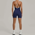 Nauwsluitende marineblauwe sportbody met witte gekruiste bandjes voor yoga en fitness - S / Marineblauw