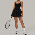 Women's black backless tennis dress with white trim and pleated bubble skirt - S / Black
