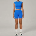 Women's royal blue two-piece yoga set featuring sleeveless crop top and high waist shorts - Sapphire Blue