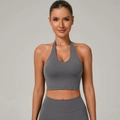 Dark gray halter neck sports bra with wide hem for women in minimalist yoga style - S / Dark Gray