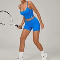 Women's bright blue yoga set featuring a strappy sports tank top and slim athletic shorts - Sapphire Blue