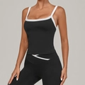 Reggiseno sportivo nero da donna con bordi bianchi a contrasto e tessuto elasticizzato - Nero