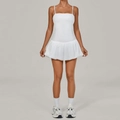 White sleeveless pleated golf tennis dress with built-in shorts for active wear - Swan White