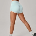 Pantaloncini da yoga verde menta a vita alta con bordo a contrasto bianco ed effetto push-up - S / Blu Ghiaccio
