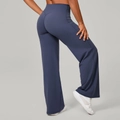 Dark blue high-waisted wide leg yoga pants showing slimming fit and flared leg design - XS / Granite Blue