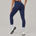 Leggings da yoga blu navy a vita alta da donna con effetto push-up e design senza cuciture - XS / Blu Notte