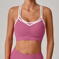 Reggiseno sportivo yoga rosa e bianco con spalline incrociate e dettagli arricciati - S / Rosa