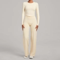 Women's cream yellow two-piece yoga set with long sleeve crop top and wide leg pants - XS / Cream Apricot