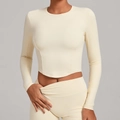 Dames crème wit nauwsluitend yoga topje met lange mouwen van stretch fitnessstof - XS / Crème Abrikoos