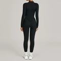 Tuta sportiva nera da donna ad alta elasticità, maniche lunghe e design posteriore unico - S / Nero