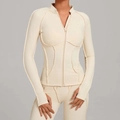 Veste de yoga moulante crème à manches longues avec col zippé et passe-pouces - Beige