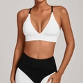 Witte sport-bh met V-hals en zwart-witte patchwork legging met hoge taille set - S / Wit