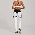 Tweeledige yogaset voor dames met zwart-witte kleurblok-legging en sportbeha voor fitness - S / Wit