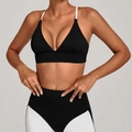 Tweeledige zwart-witte sportset met verstelbare beha en legging met hoge taille - S / Zwart
