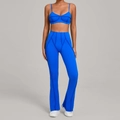Electric blue yoga set featuring a strappy sports bra and high-waisted flared leggings - S / Royal Blue
