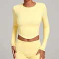Slim fit light yellow long sleeve yoga top with high waist matching sports leggings - Durian Yellow