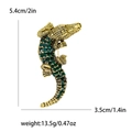 Vintage crocodile brooch pin in gold plating with green rhinestones and size details - Green
