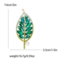 Eleganter Blatt-Anstecknadel mit grünen Kristallen und Perle, 7,6 cm Längenabmessung - Grün