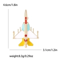 Matte enamel fighter jet brooch with dimensions 4.6cm x 3.1cm on white background - Blue