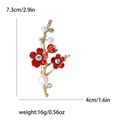 Floral branch brooch with red enamel petals, crystals and a large pearl in gold finish - Red