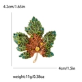 Spilla a foglia d'acero dorata con cristalli colorati e misure dettagliate - Verde