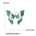 Broche de mariposa vintage en esmalte verde con pedrería y acabado en plata - Verde-4048