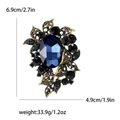 Eleganter Vintage Gold Brosche mit großem ovalem blauem Kristall und Strass Akzenten - Blau