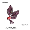 Eleganter vergoldeter Blatt-Brosche mit roten Kristallen und rosa Strass auf weißem Grund - Pflaumenrot
