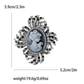 Broche camée vintage en argent avec strass noirs et dimensions physiques affichées - Noir
