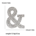 Silver ampersand brooch with rhinestones measuring 4.2cm in height for suits - Silver