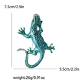 Broche lagarto de esmalte azul con diamantes de imitación verdes y medidas de 7,5cm por 5,5cm - Azul