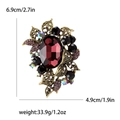 Eleganter Vintage-Brosche mit dunkelrotem Edelstein und violetten Kristallen - Lila