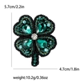 Handmade clover brooch with dark green crystals and light blue pearls, size 5.7cm by 4.7cm - Green