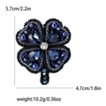 Navy blue four-leaf clover brooch with rhinestones and detailed size measurements - Blue