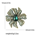 Vintage green rhinestone flower ribbon brooch in antique gold finish with dimensions - Green