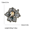 Broche fleur évidée en métal noir avec strass et pierre précieuse champagne, guide taille - Champagne-4098