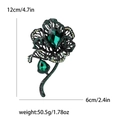 Eleganter Vintage Blumen-Brosche mit schwarzem Metall, Strass und grünen Kristallen - Grün (4099)